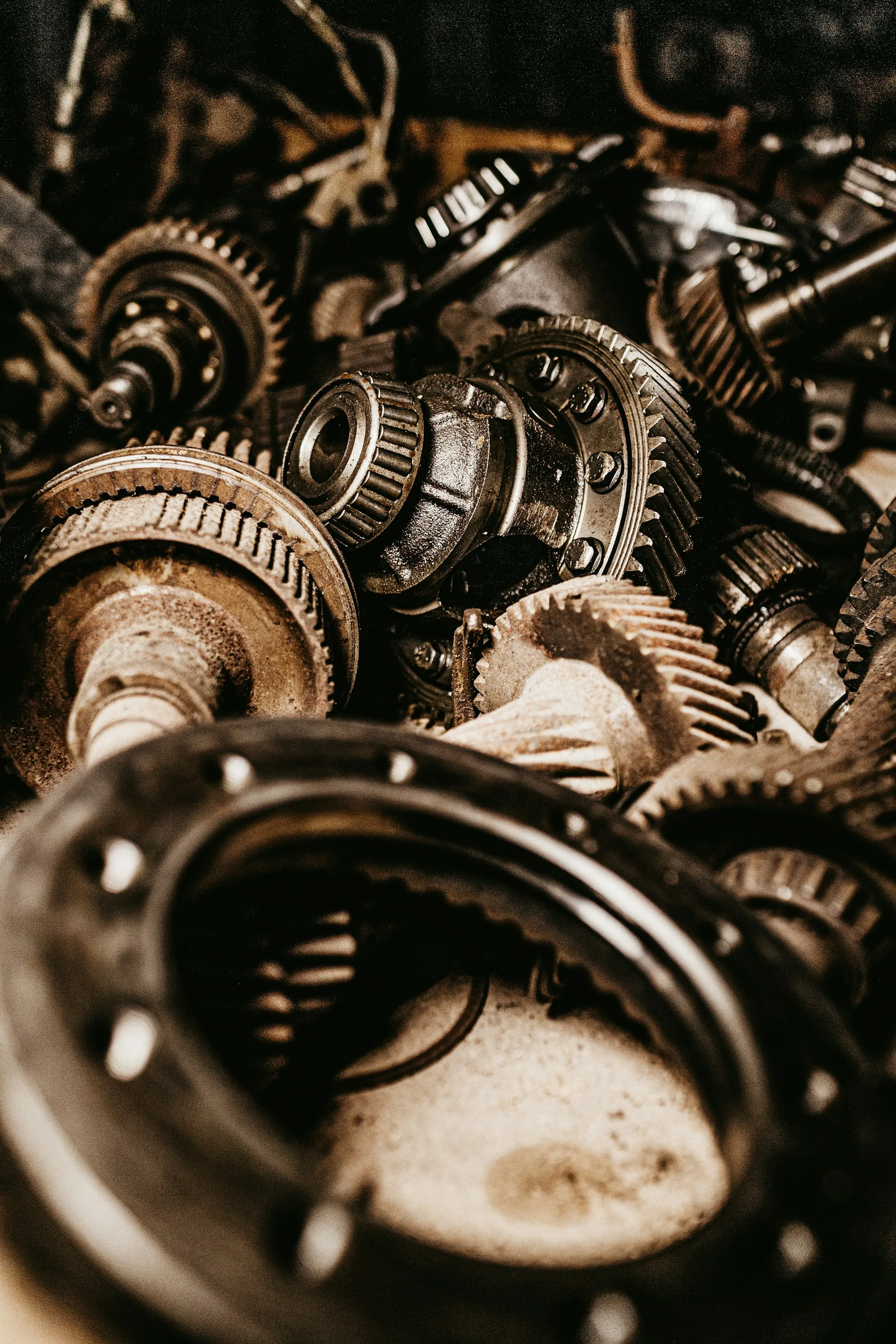 Pile of steel gears and engine parts